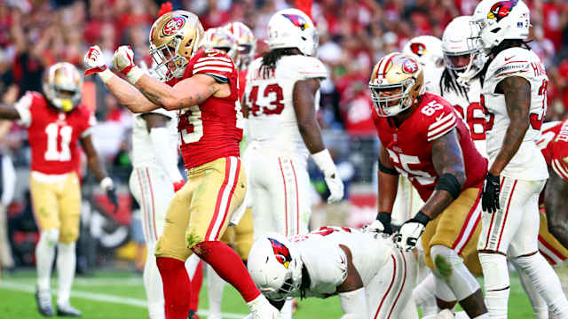 Dec 17, 2023; Glendale, Arizona, USA; San Francisco 49ers running back Christian McCaffrey (23) celebrates after running for a touchdown during the third quarter against the Arizona Cardinals at State Farm Stadium. Mandatory Credit: Mark J. Rebilas-USA TODAY Sports